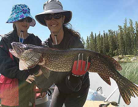 Kids Catching BIG Northern Pike Fishing at Manitoba Canada Fly in Lodges.