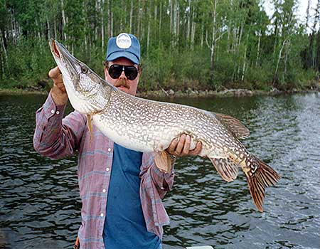Catch Your Trophy. Trophy northern pike fishing in remote fly in Canada fishing.