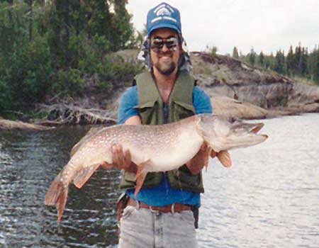 Trophy northern pike fishing in Cobham River, Manitoba, Canada