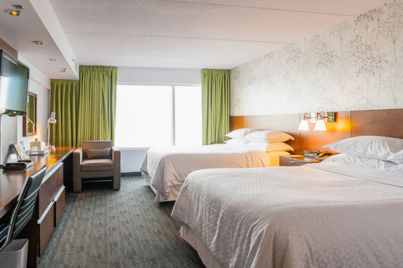 Stay connected with free WiFi and a business center and keep satiated with a restaurant, lounge, bar, and room service.